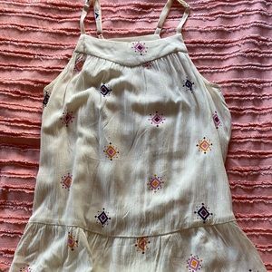 white patterned tank top